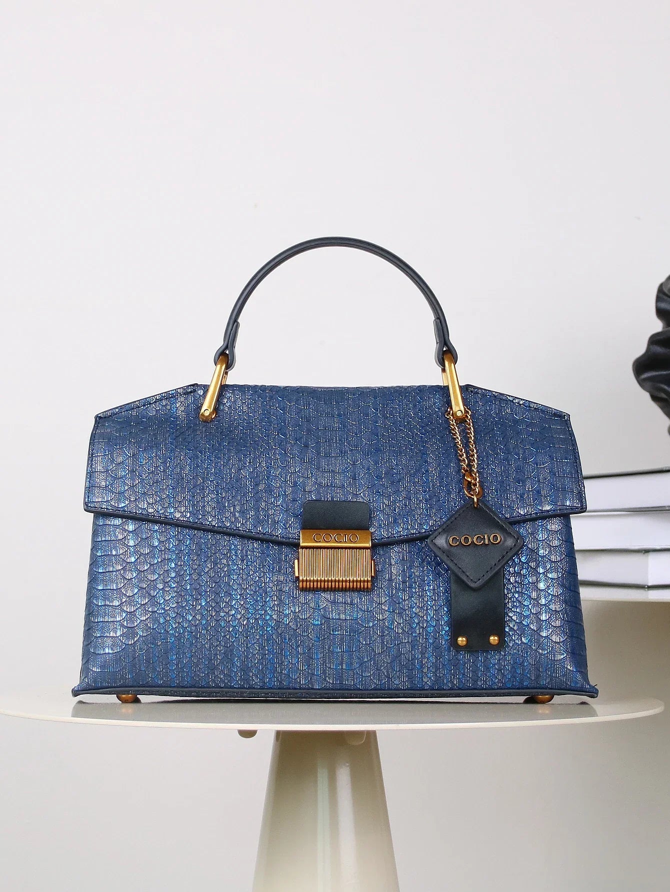 Women’s Top Handle Bag with Embossed Texture and Front Flap Closure