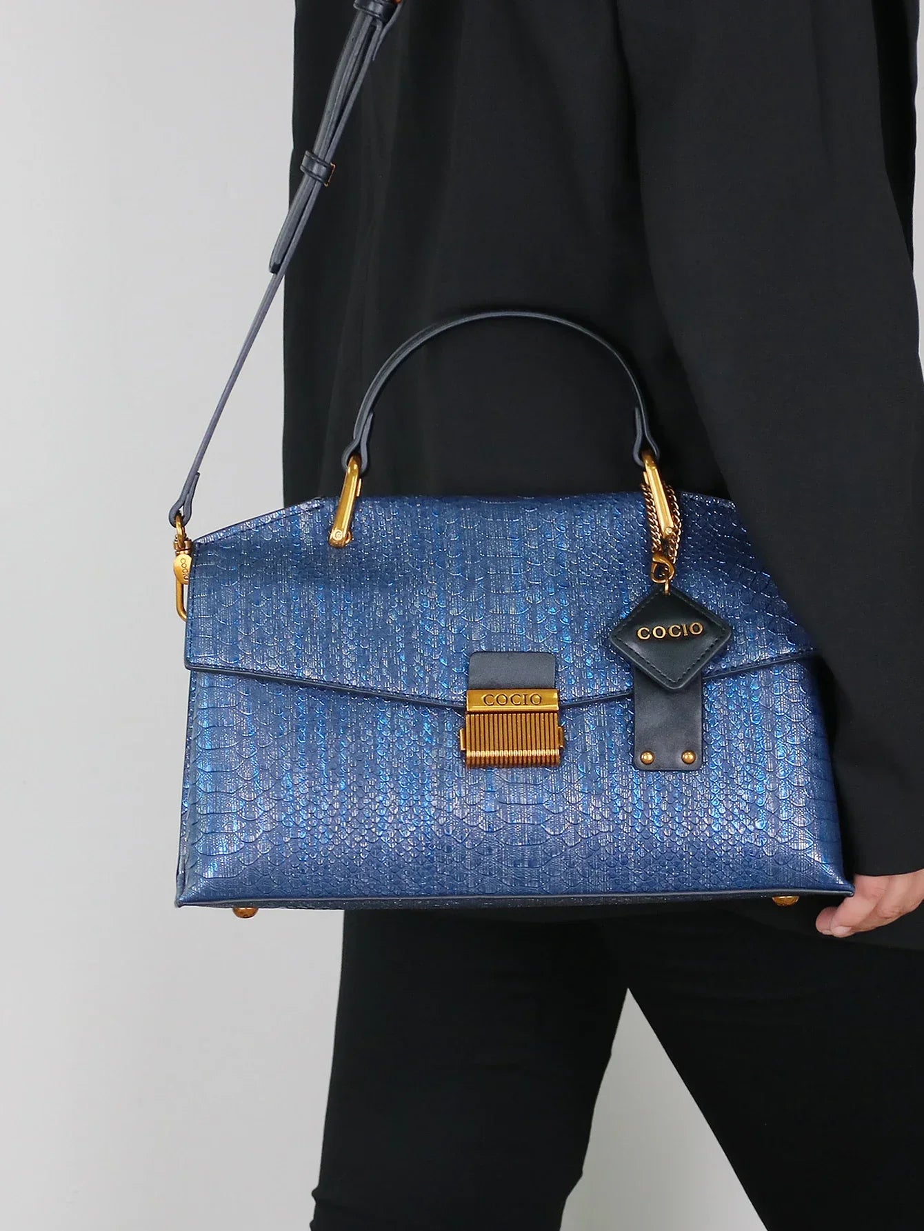 Women’s Top Handle Bag with Embossed Texture and Front Flap Closure