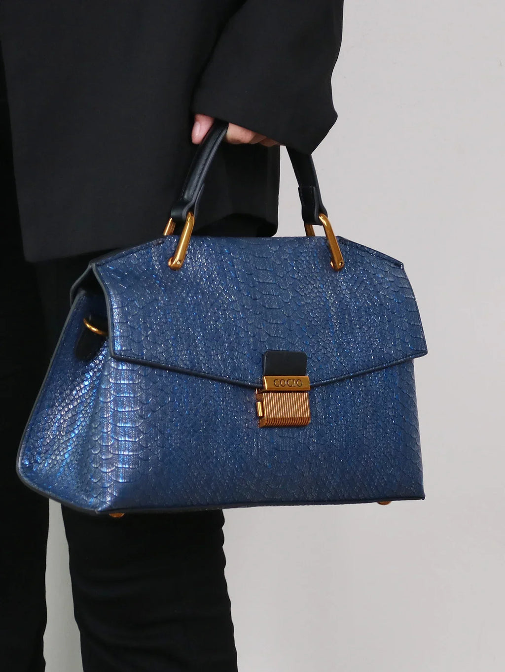 Women’s Top Handle Bag with Embossed Texture and Front Flap Closure