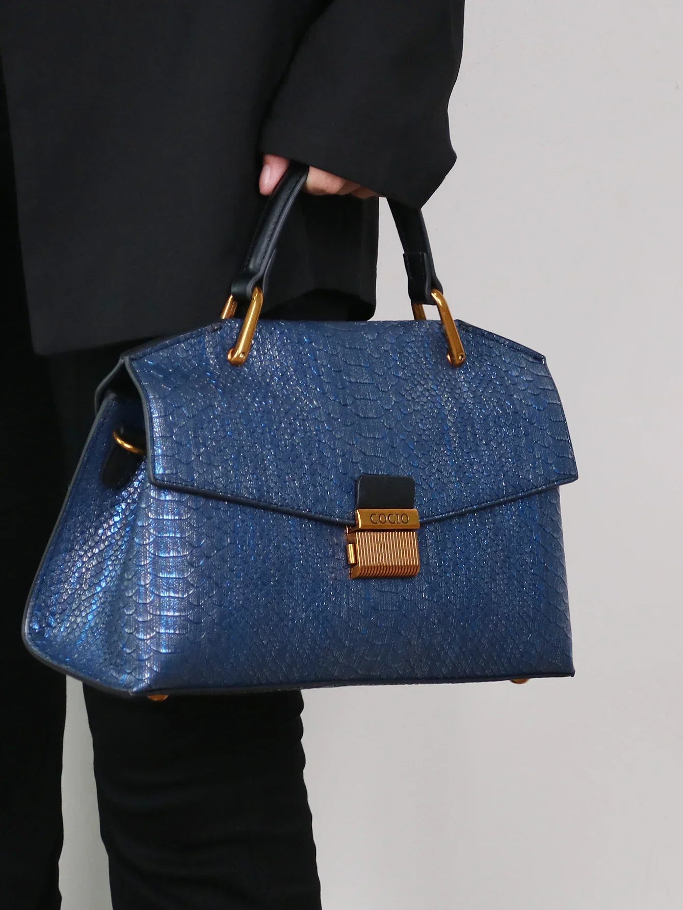 Women’s Top Handle Bag with Embossed Texture and Front Flap Closure