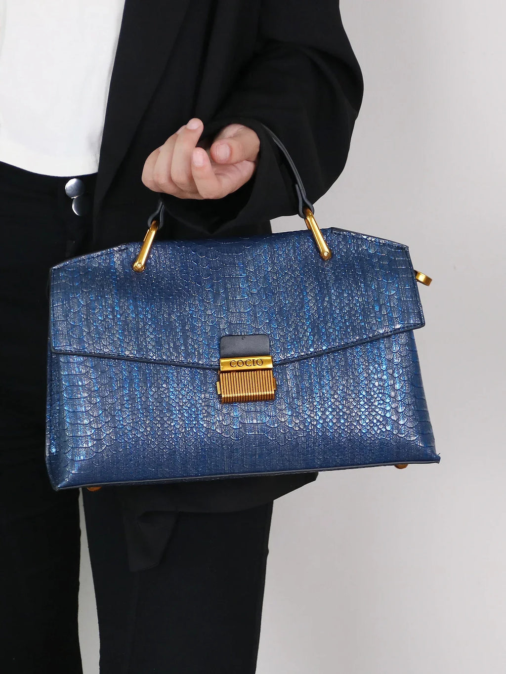 Women’s Top Handle Bag with Embossed Texture and Front Flap Closure