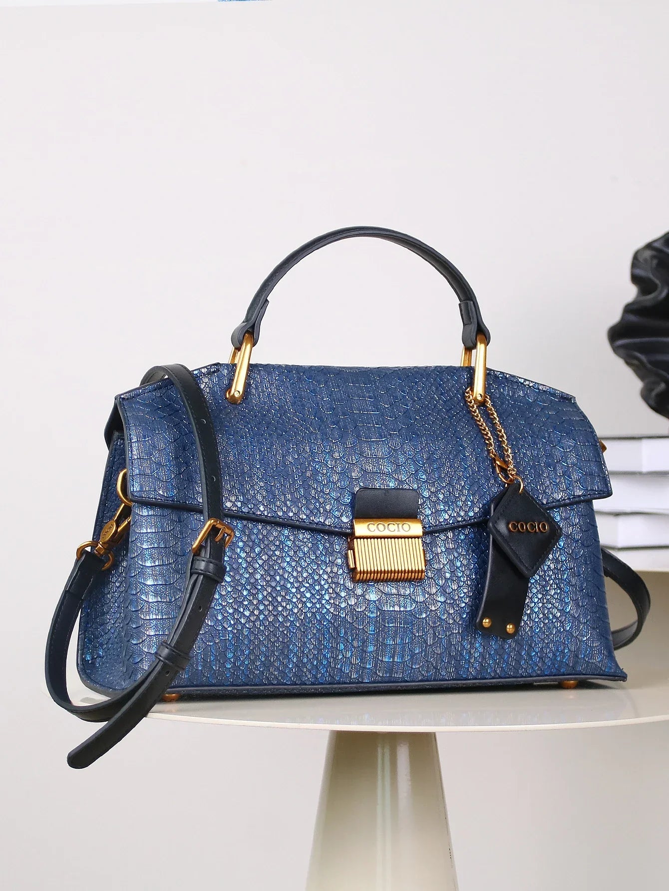 Women’s Top Handle Bag with Embossed Texture and Front Flap Closure